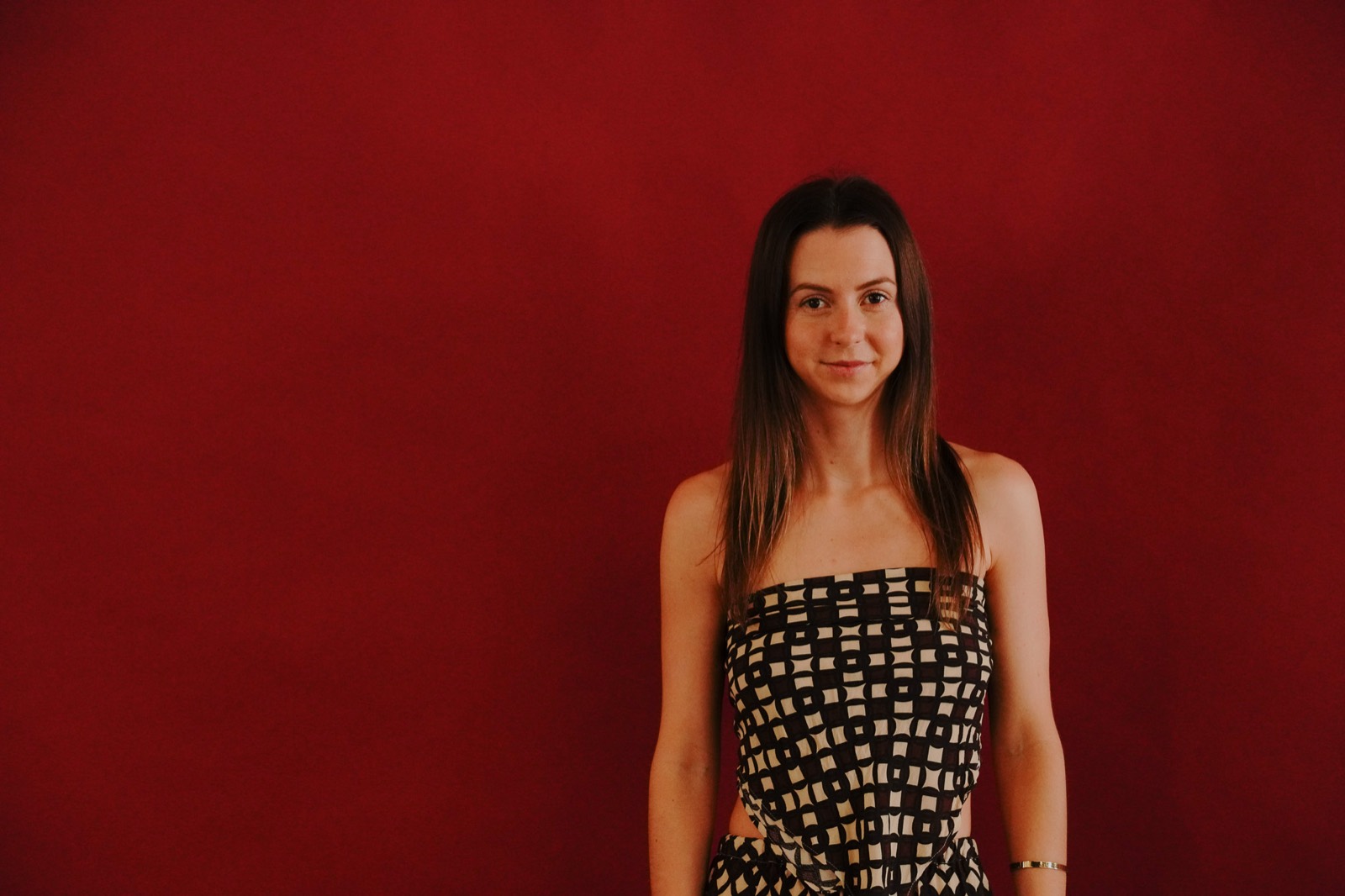 Rachel, Studio Willow web designer, smiling in the studio